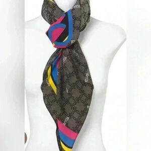 TOUS Logogram collection scarf in black, with TOUS logo print babushka hijab